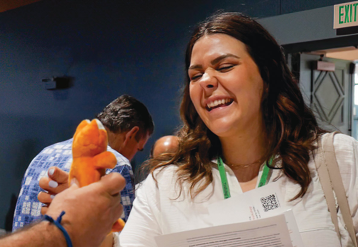 A plush orange frog sparks a smile.