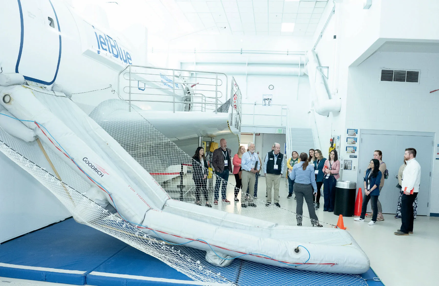 A JetBlue University tour guide details “slide training.”