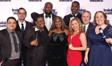 Winners celebrate with some fun photo props. PHOTOGRAPHY BY HUGHES FIORETTI PHOTOGRAPHY