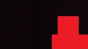 Lower-case red t on black background