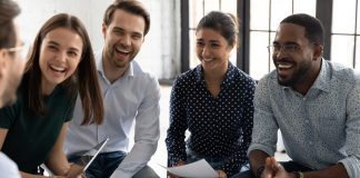 Coach,Or,Group,Leader,Telling,Funny,Story,Or,Joke,To